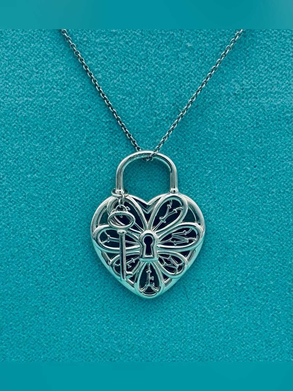Tiffany & Co. Retired Filigree heart and key necklace 16”